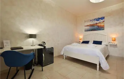 Letto o letti in una camera di Nice Home In Sant'alfio With Sauna