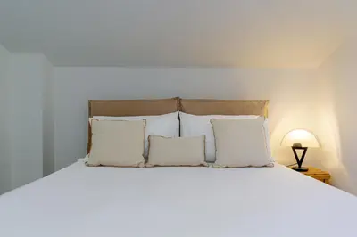Letto o letti in una camera di Villa Agata