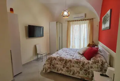 Letto o letti in una camera di Casa San Brasi di Mariano e Lucia