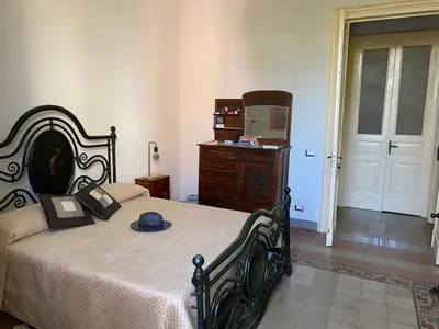 Letto o letti in una camera di Maison Ruggero
