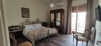 Letto o letti in una camera di Radici