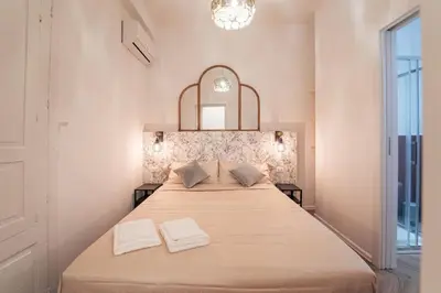 Letto o letti in una camera di Elegant design apartment in historical city center