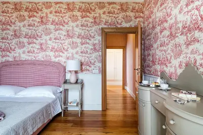 Letto o letti in una camera di La Capinera