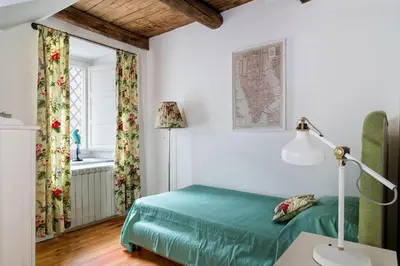 Letto o letti in una camera di La Capinera