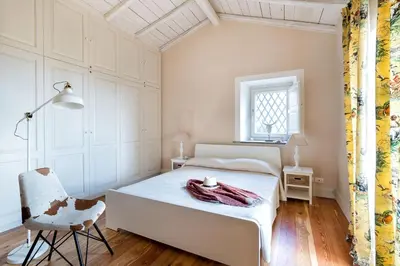 Letto o letti in una camera di La Capinera