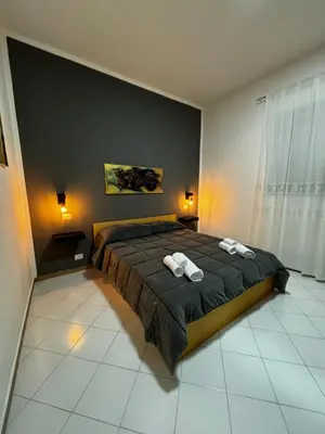 Letto o letti in una camera di Casa Francesca