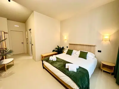 Letto o letti in una camera di CARBONE XXI