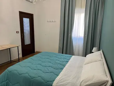 Letto o letti in una camera di Gioia di Casa - Appartamento