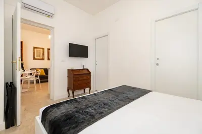 Letto o letti in una camera di Finestre sul mare