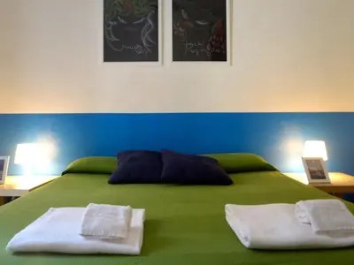 Letto o letti in una camera di Gianluca's Room