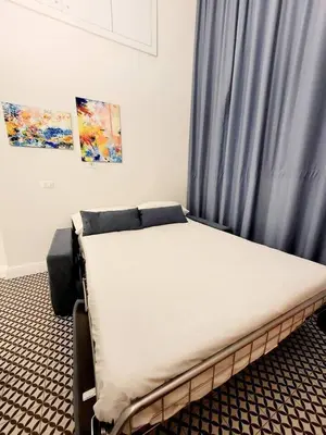 Letto o letti in una camera di Le Volte and Suite