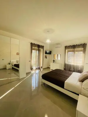 Letto o letti in una camera di La Pigna Casa Vacanza