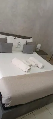 Letto o letti in una camera di Homesweet