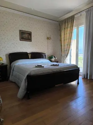 Letto o letti in una camera di la terrazza sull ETNA
