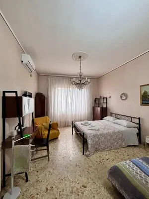 Letto o letti in una camera di Stanza 30 euro per 2 ore Giarre