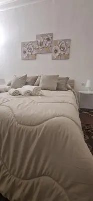 Letto o letti in una camera di Stesicoro house