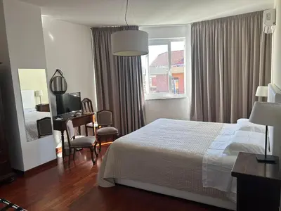 Letto o letti in una camera di RAMO FIORITO
