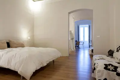 Letto o letti in una camera di Loft Centro Ingresso Indipendente Giardino Privato