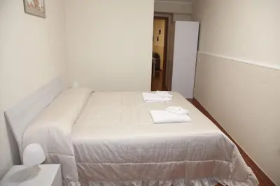 Letto o letti in una camera di La Casetta Per Te