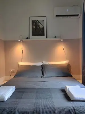 Letto o letti in una camera di La Casa di Madhu