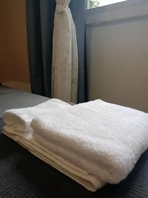 Letto o letti in una camera di La Casa di Madhu