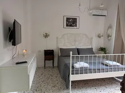 Letto o letti in una camera di La Casa di Madhu