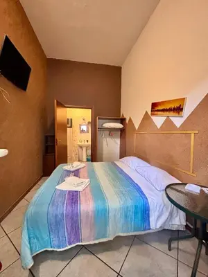 Letto o letti in una camera di Holiday home for groups Acireale