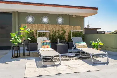 Area soggiorno di Medea home