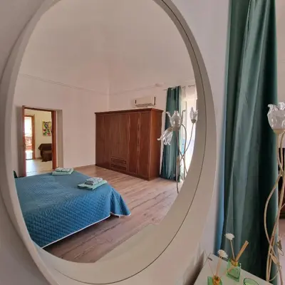 Letto o letti in una camera di Casa Sicilia Bedda