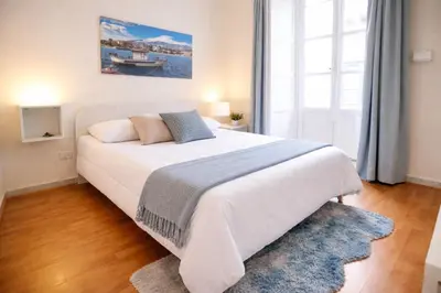 Letto o letti in una camera di Etnea Rooms 270