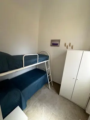 Letto o letti in una camera di Casa Betulla di Palazzo Biondi