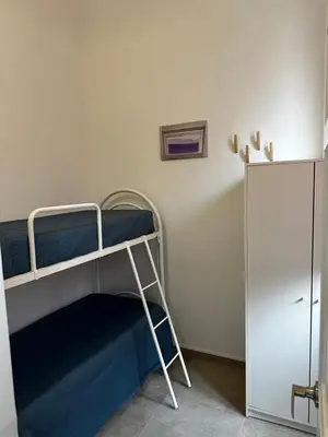Letto o letti in una camera di Casa Betulla di Palazzo Biondi