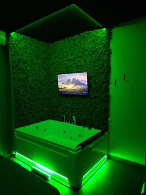 TV o dispositivi per l'intrattenimento presso Dark & Light rooms & luxury suites