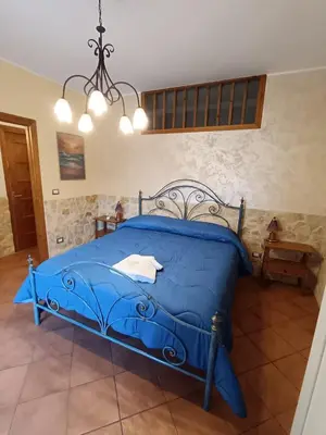 Letto o letti in una camera di Abbentu
