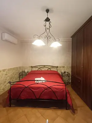 Letto o letti in una camera di Abbentu