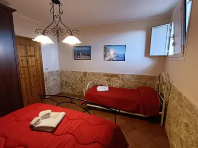 Letto o letti in una camera di Abbentu