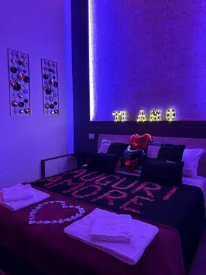 Letto o letti in una camera di Atanasia Suite