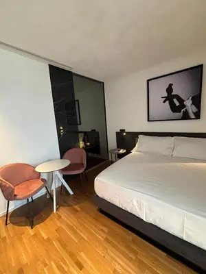 Letto o letti in una camera di MòN Luxury Rooms SPA