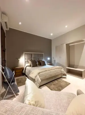 Letto o letti in una camera di Le Cento Sculture Apartment