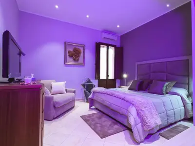 Letto o letti in una camera di Le Cento Sculture Apartment