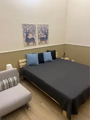 Letto o letti in una camera di mandarino & limone casa vacanze