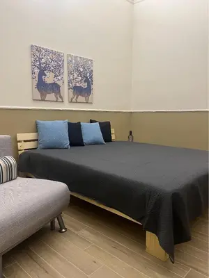 Letto o letti in una camera di mandarino & limone casa vacanze