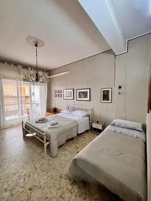 Letto o letti in una camera di Lg Giarre Apartment in Italy