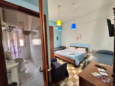 Letto o letti in una camera di Guest house in Acireale