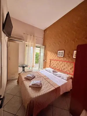 Letto o letti in una camera di BB Minicurcu, camere doppie