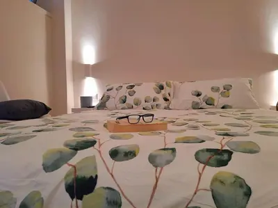 Letto o letti in una camera di Acasuzzadiaci