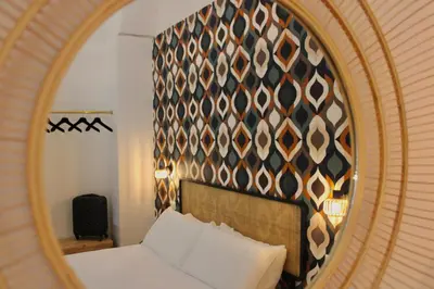 Letto o letti in una camera di Bellini Charm Apartments