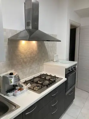 Cucina o angolo cottura di ADiNHOME ACICASTELLO