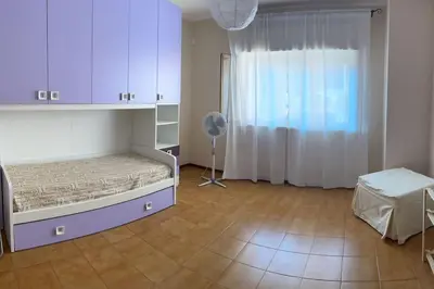Letto o letti in una camera di Casa Ultreia, appartamento