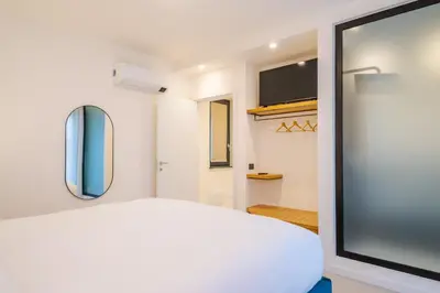 Letto o letti in una camera di Paolimura Resort , Apartment & Spa